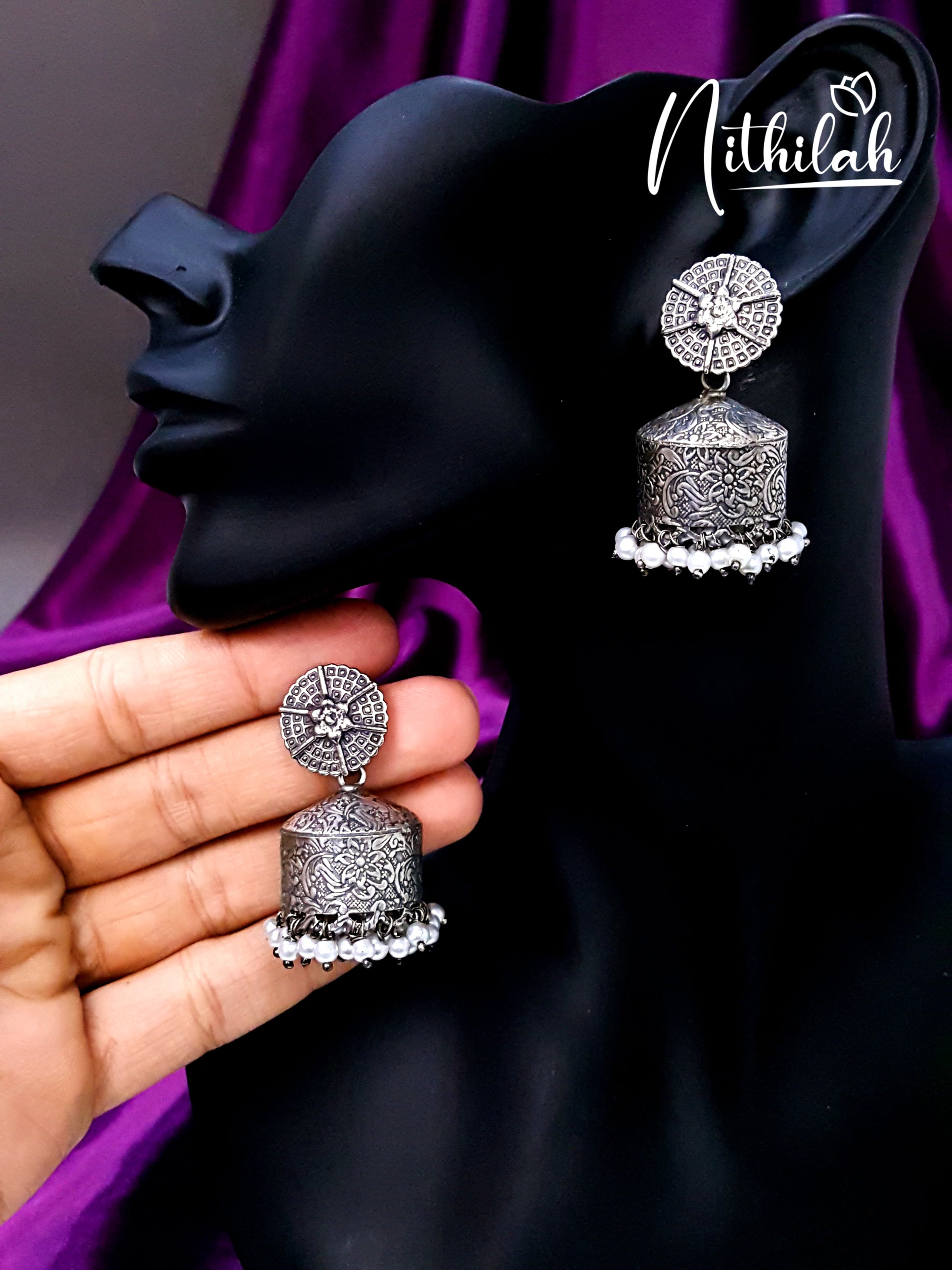 Buy Embossed Tent Shaped Oxidised Jhumka Earrings