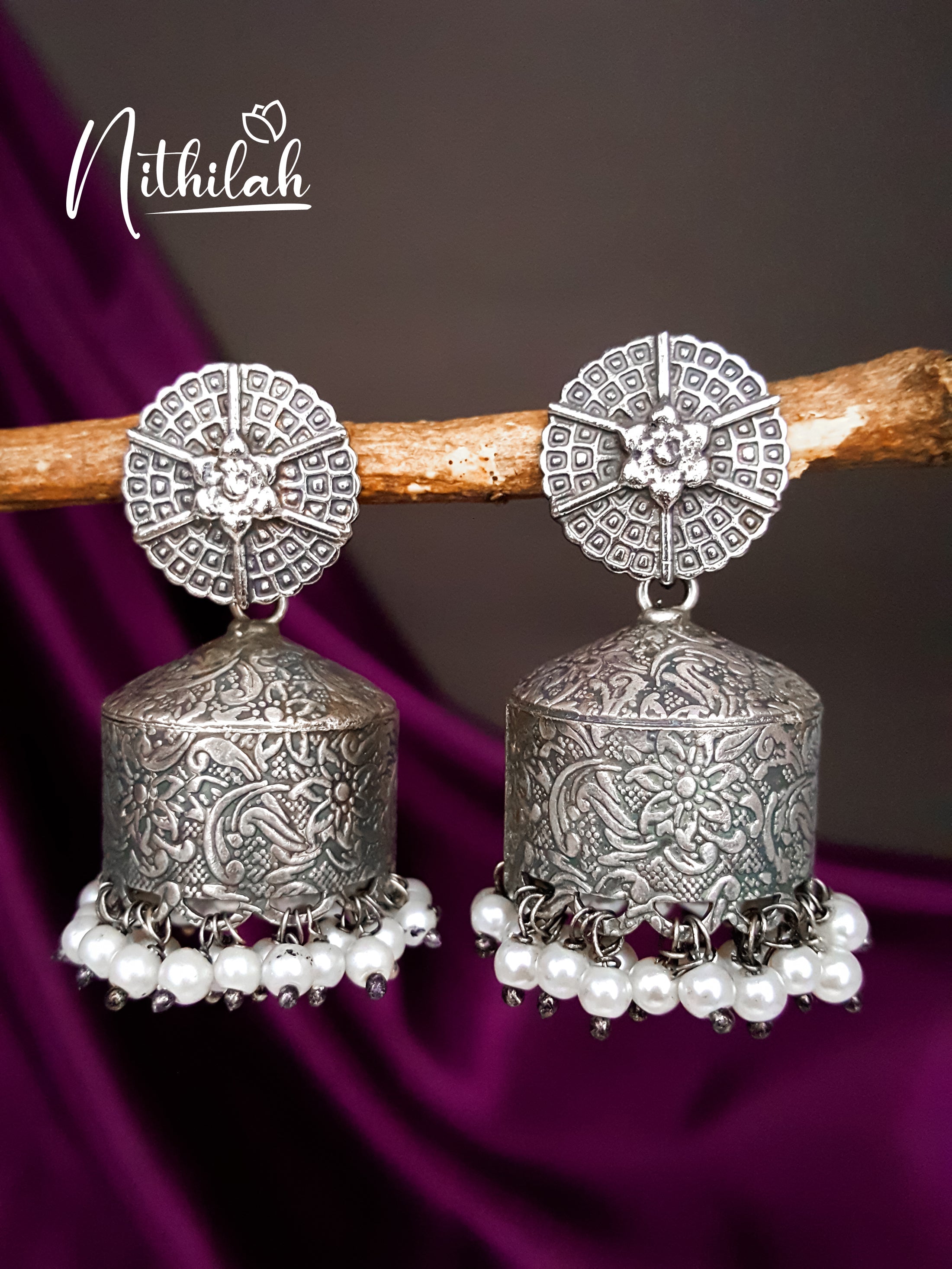 Buy Embossed Tent Shaped Oxidised Jhumka Earrings