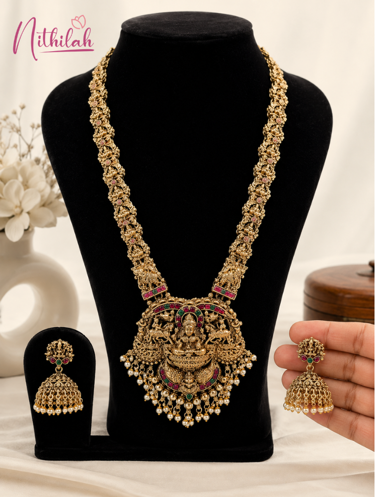 Antique Gold Finish Lakshmi Pendant Necklace with Ruby Pink Stones