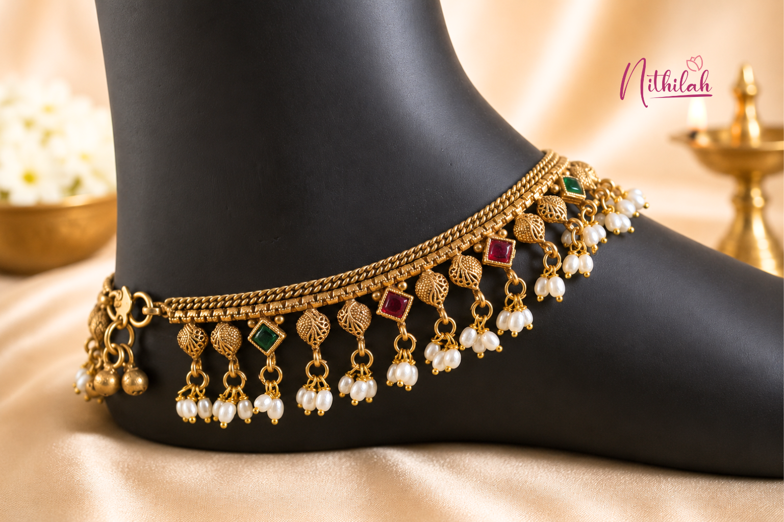 Antique Gold Finish Traditional Pearl Anklet with square red and green stones for women, perfect for weddings, festivals and ethnic wear.