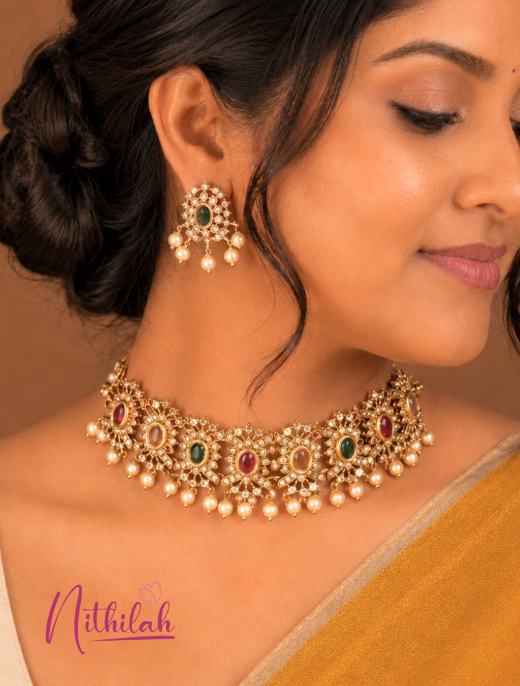 Woman Wearing Gold Finish American Diamond Choker Necklace Set with Ruby Pink Stones, Green Stones, Pearl Drops and Matching Earrings
