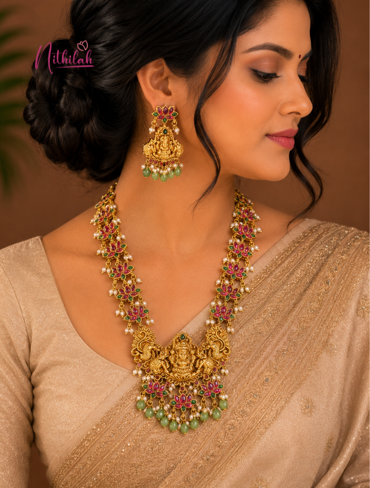 Gold Finish Lakshmi Temple Necklace Set with Ruby Pink Stones and Pearl Drops – Model View