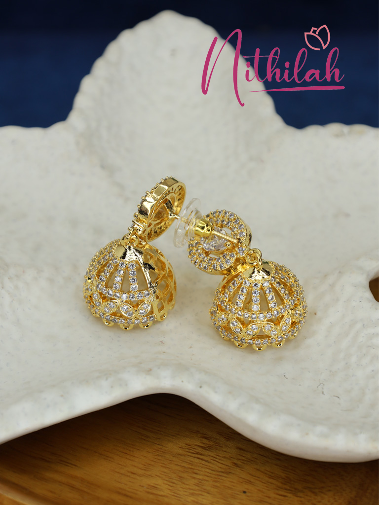 Backside of Pair of gold-plated American Diamond jhumka earrings with teardrop centre stones showing pushback 