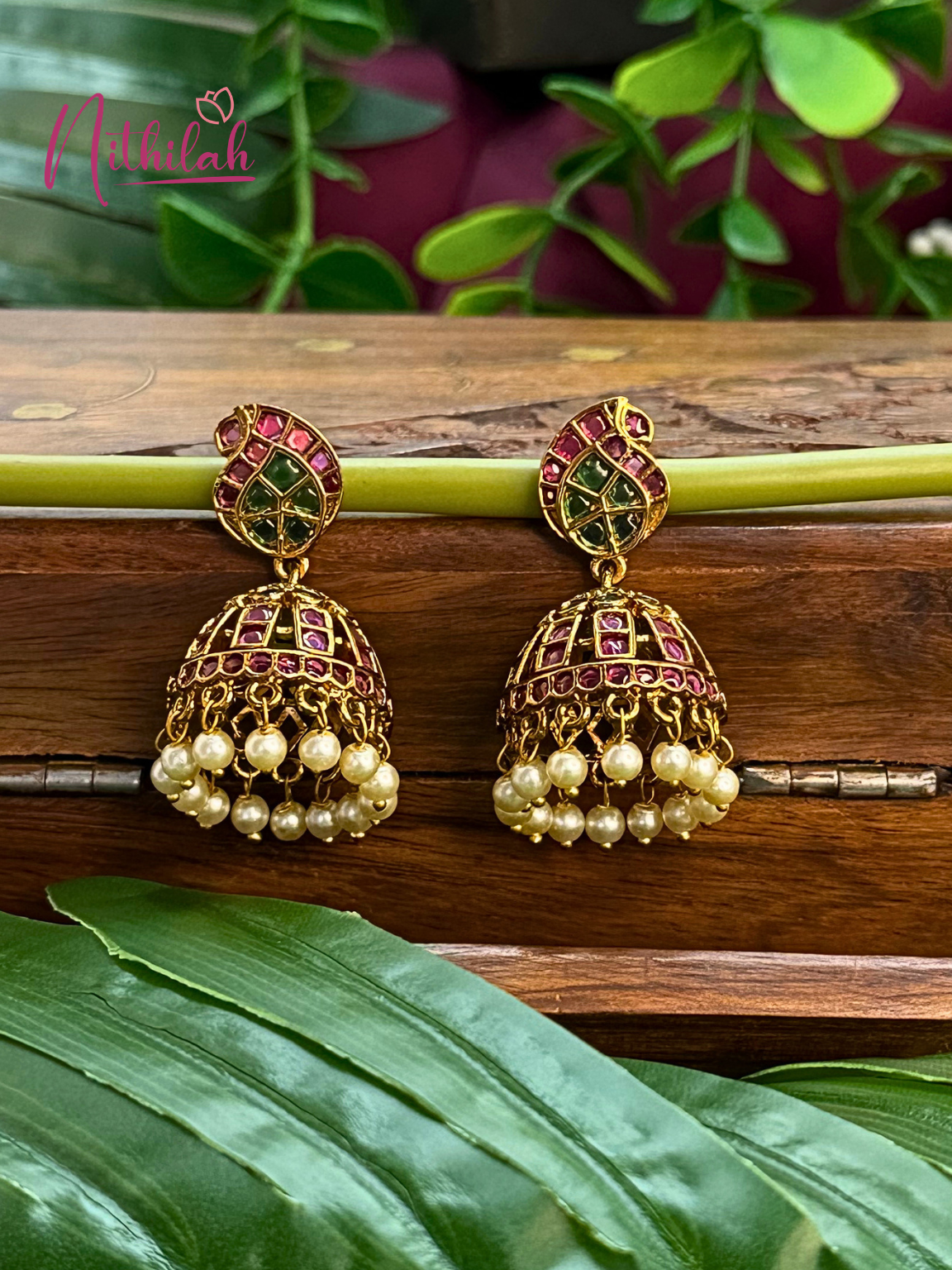 Gold tone Kemp stone jhumka earrings with pearl drops