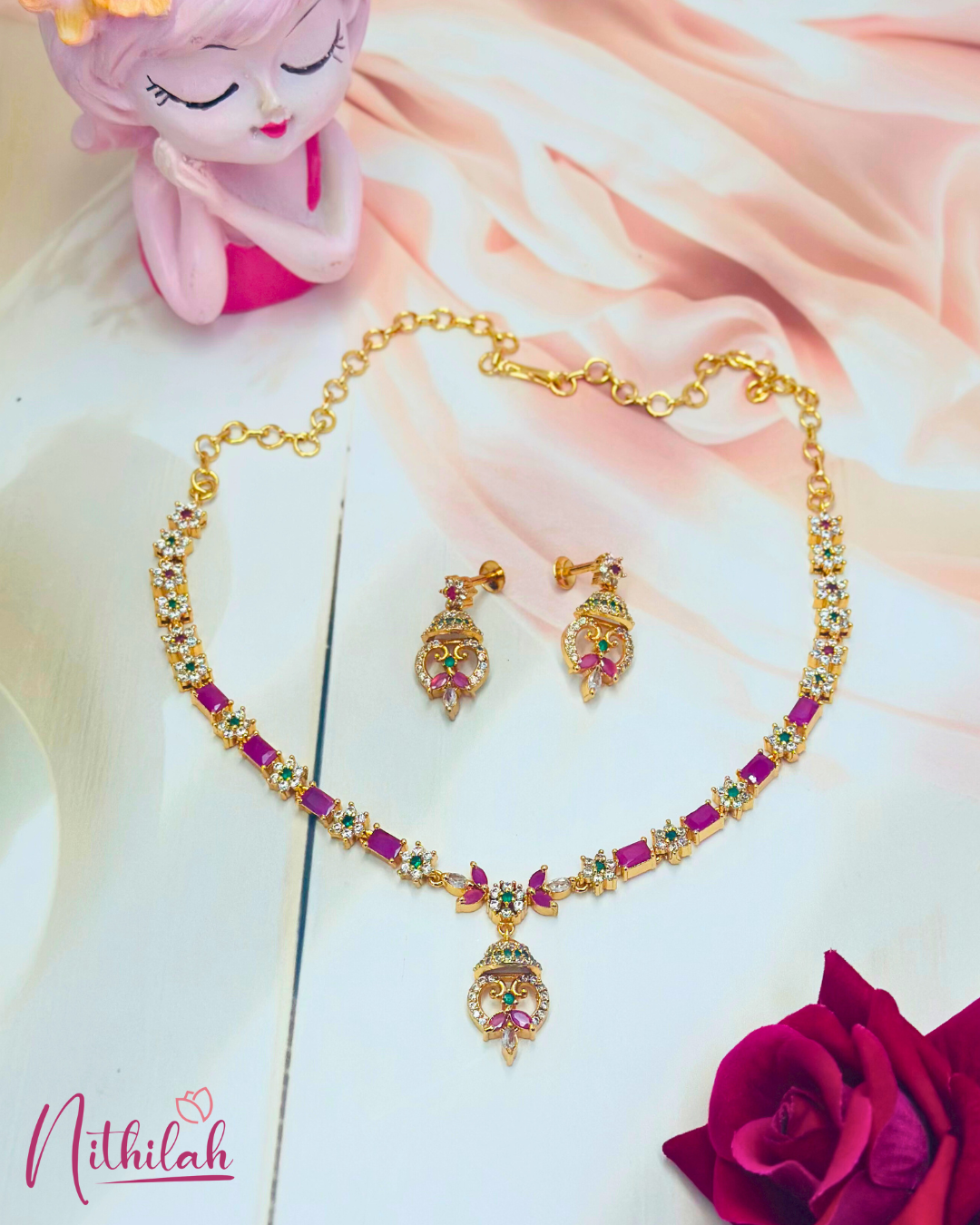 Ruby Pink American Diamond Gold Finish Necklace Set - close-up flat lay detail