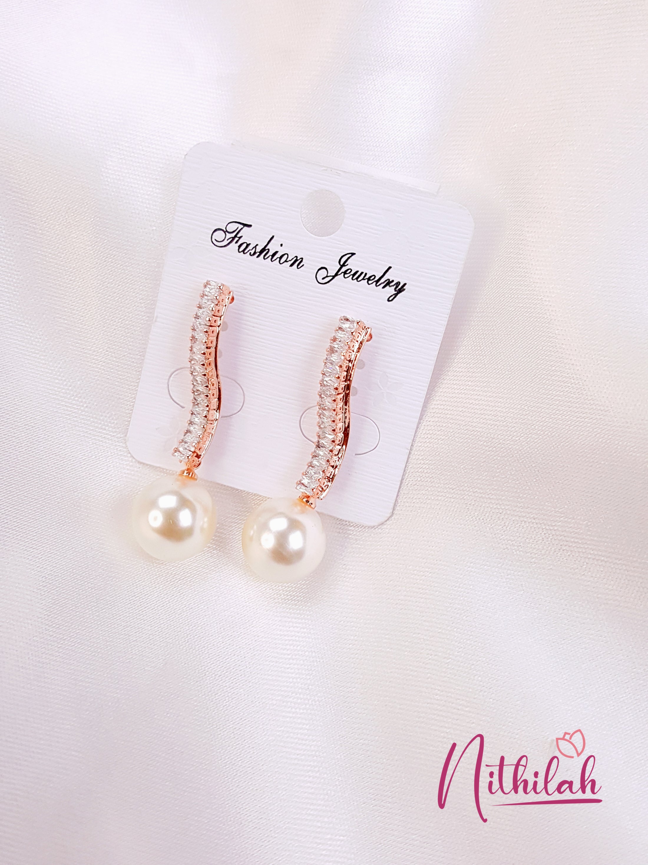 Buy Rose Gold Earrings Fancy S Shaped with Pearl 