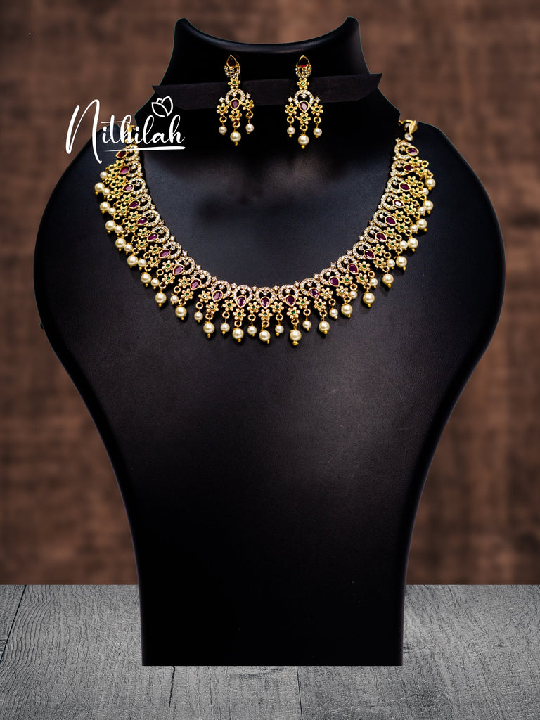 MATTE FLOWER DROP AD STONES CHOCKER NECKLACE GOLDEN – Nithilah