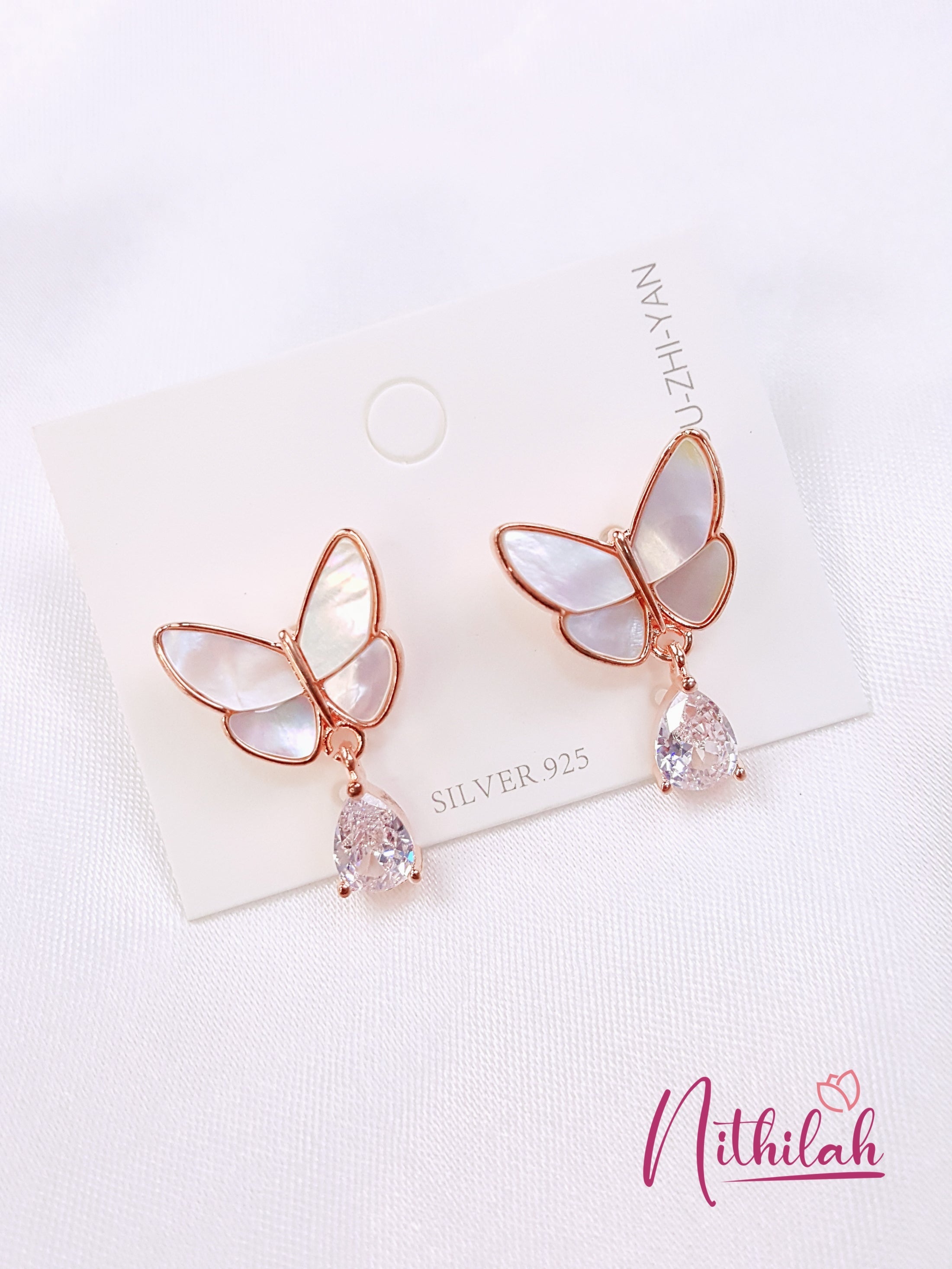 Buy Imitation Jewellery Mother of Pearl Butterfly Rose Gold Earrings NPJE122 Online